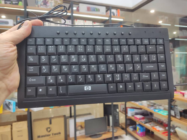کیبورد سیمی اچپی مدل K600 MINI - بدنه ترکیبی فلز و پلاستیک - طراحی مینی و جمعوجور - 5 میلیون ضربه - اقتصادی و باکیفیت